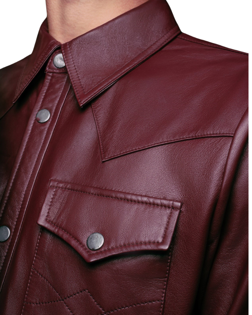Picture of a model wearing our dark red leather shirt, front, close up view.