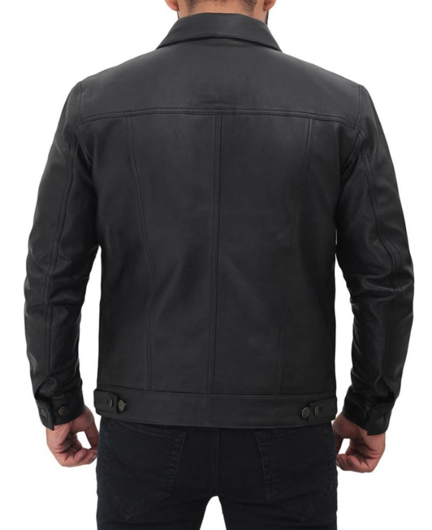 Picture of a model wearing our Mens Black Leather Trucker Jacket back view .