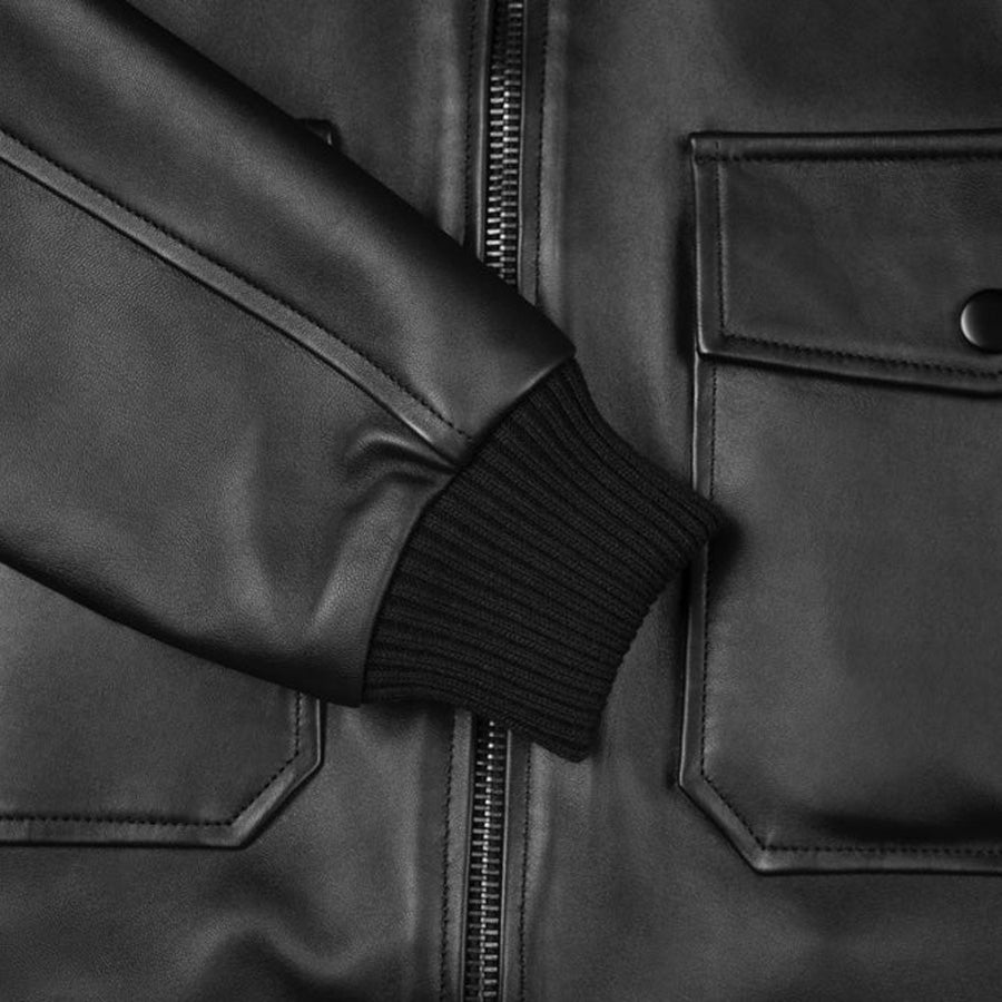 Picture of our black Pilot Leather Jacket for Men close up view or ribbed sleeve end.