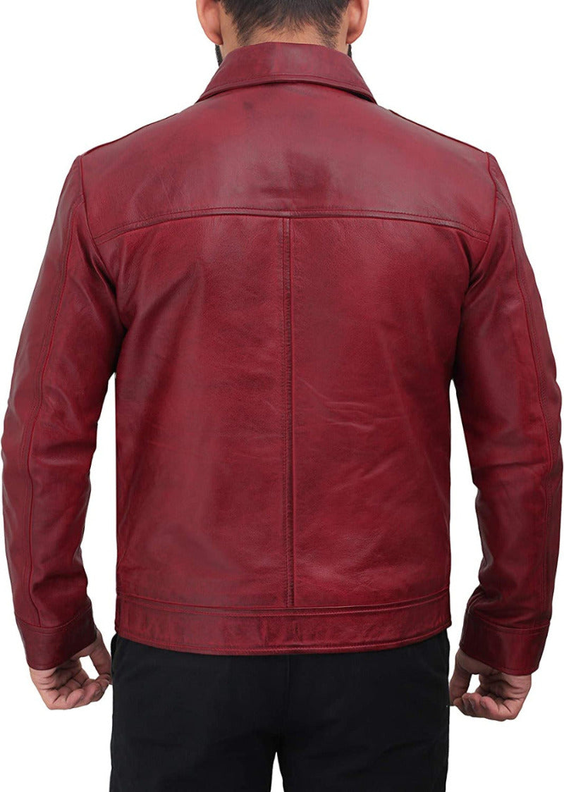 Picture of a model wearing our Mens Waxed Leather Jacket in maroon, back view.