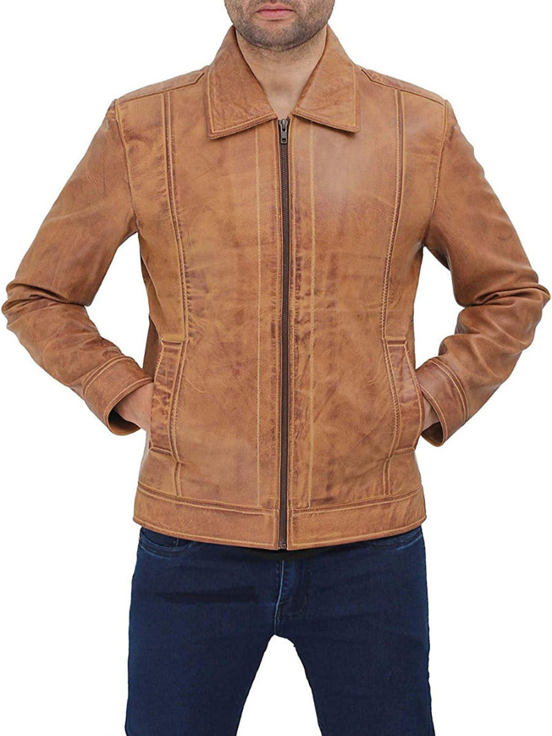 Picture of a model wearing our Mens Waxed Leather Jacket in tan front view with zipper closed.
