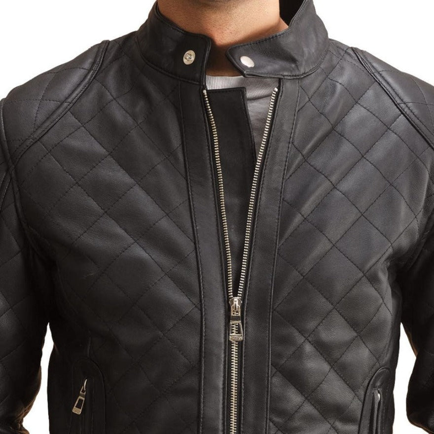 Picture of a model wearing our Black Leather Jacket Quilted  in black with silver zippers. Close up front view.
