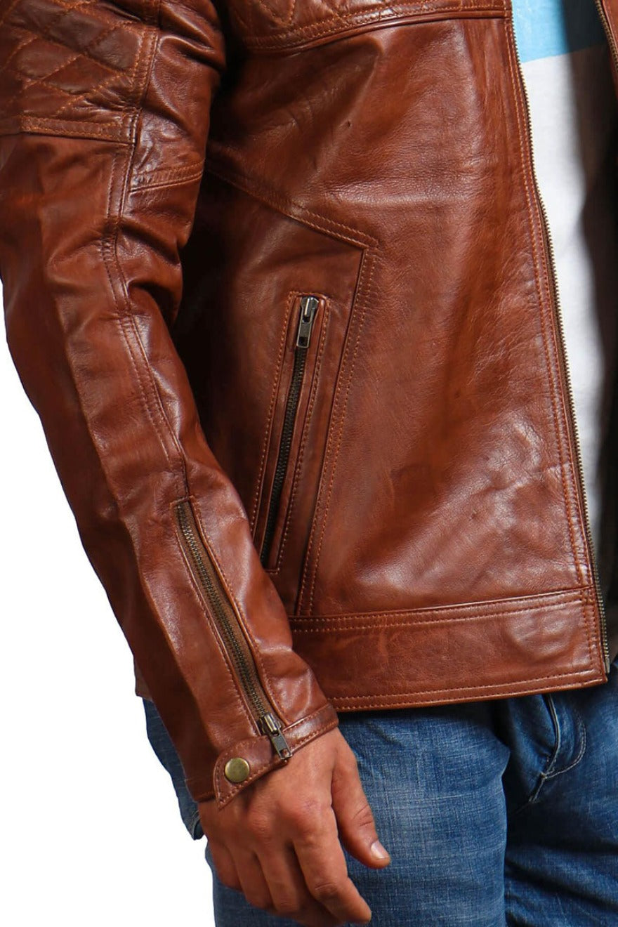 Close up arm view of  model wearing our Mens Racer Leather jacket with quilted shoulders and chest. 