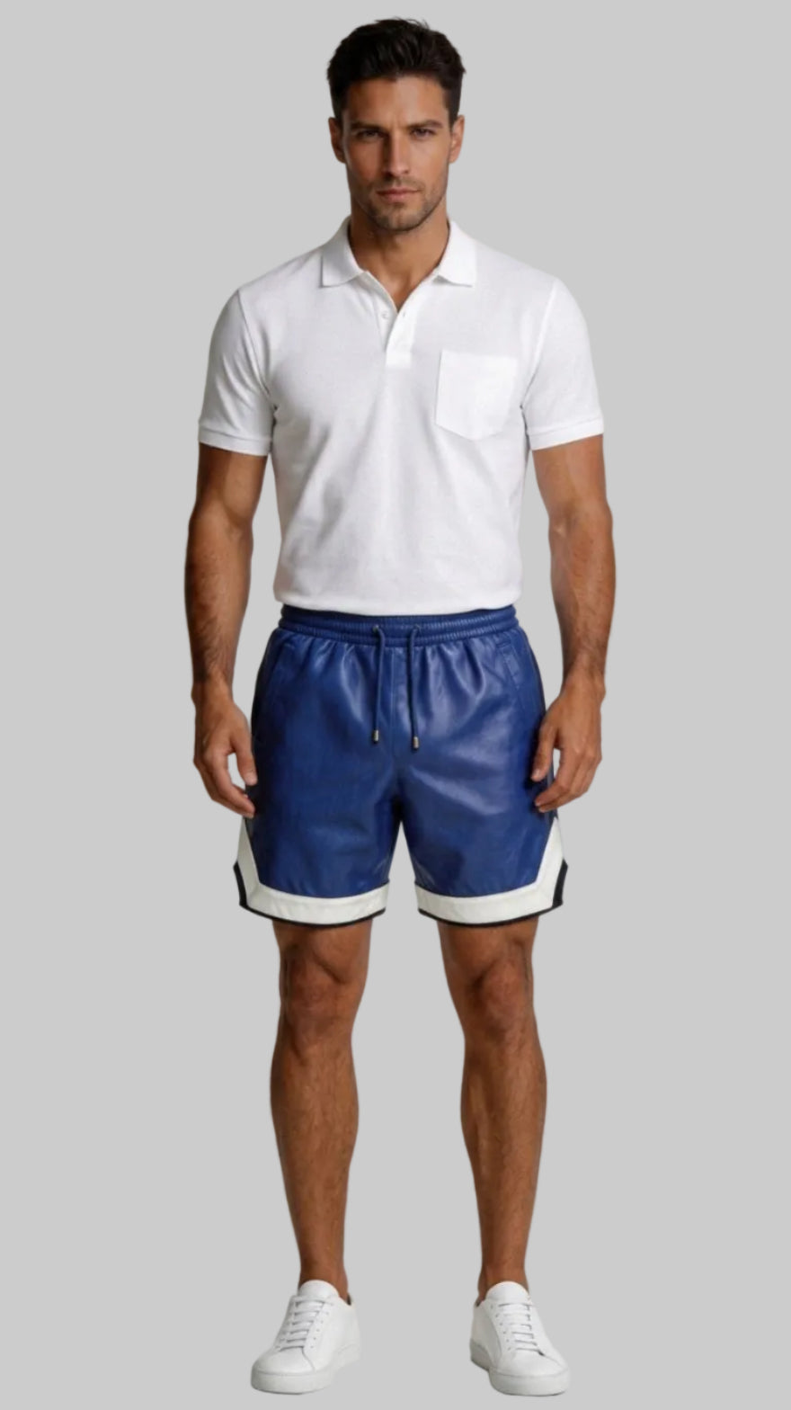 Man wearing a white polo shirt and our Blue Mens Leather Shorts with Contrast Side Stripe  against a white wall, front view.
