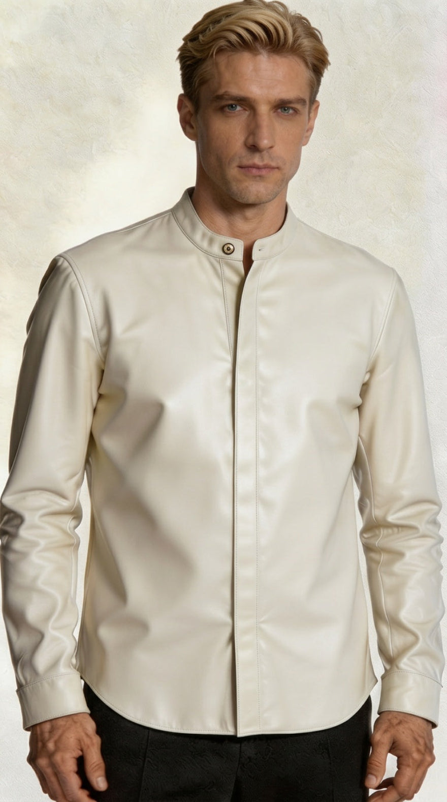 Man wearing our Cream Long Sleeve Leather Shirt against a textured light background, front view.