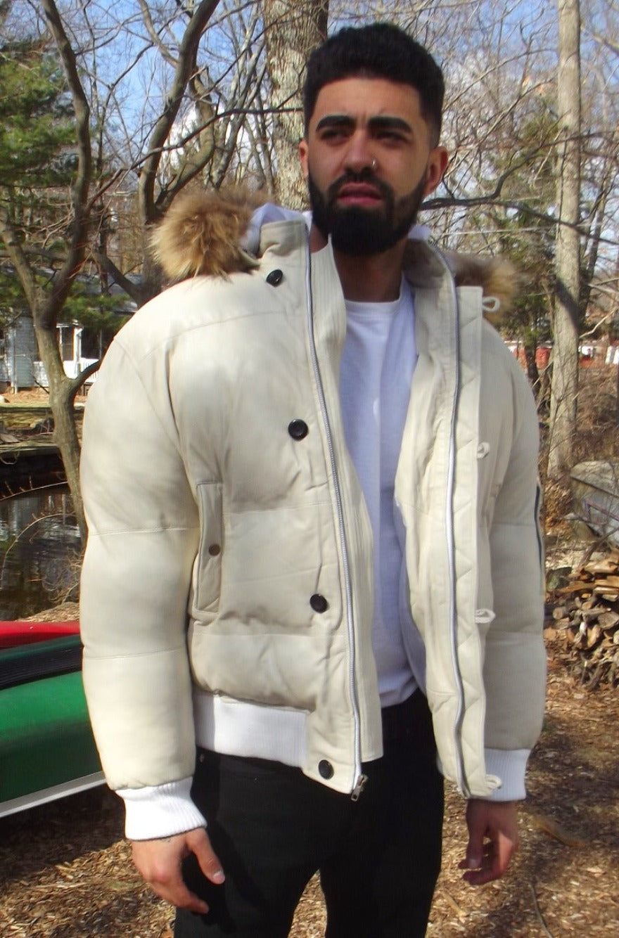 Picture of a model wearing our White Leather Puffer Jacket, front  view with zipper open and hood down.