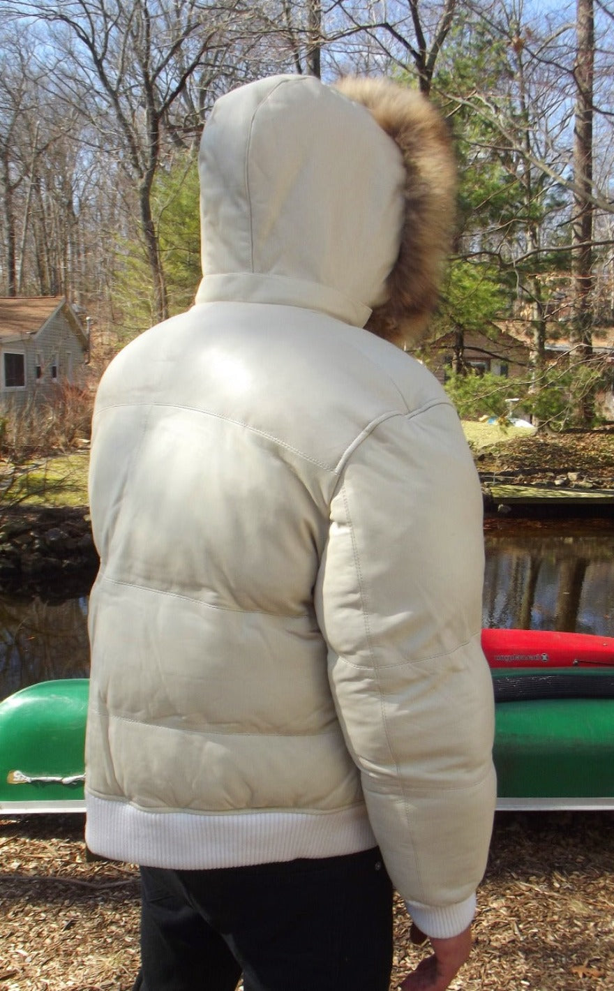 Picture of a model wearing our White Leather Puffer Jacket, back view