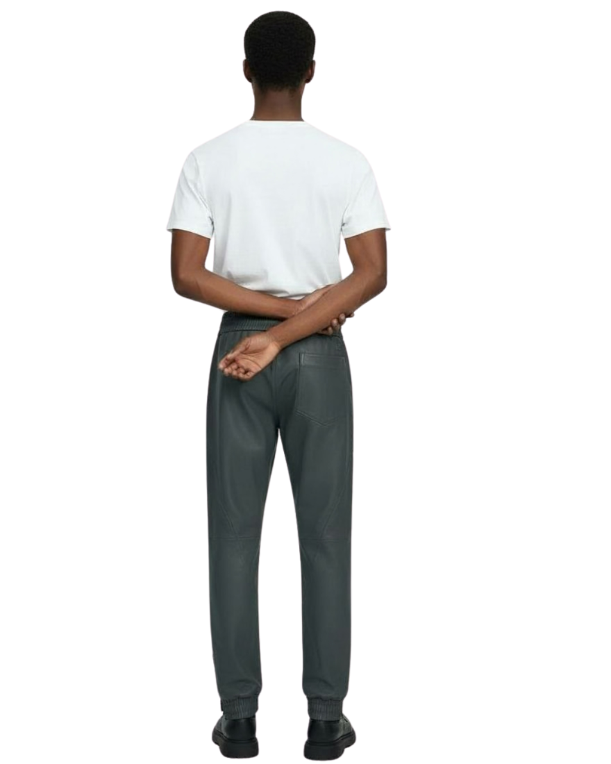 Person wearing a white t-shirt and our grey leather joggers, back view, on a white background