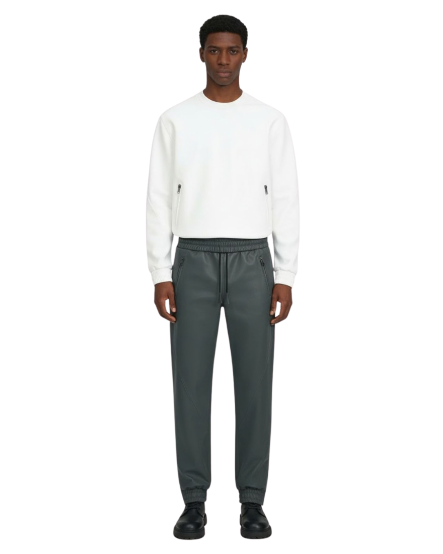 Person wearing a white sweater and our grey leather joggers, on a white background