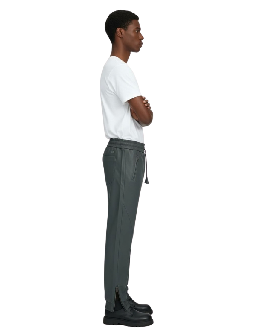 Person wearing a white t-shirt and our grey leather joggers, side view, on a white background