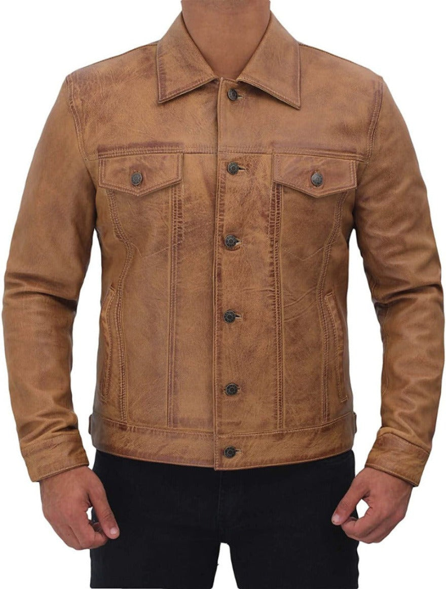 Picture of a model wearing our tan leather trucker jacket, front view with buttons closed.