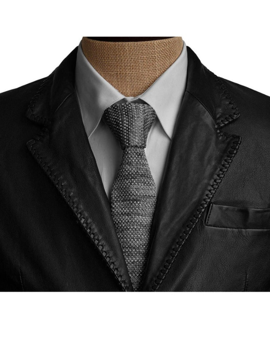 Picture of our Mens Black Leather Blazer, close up view of the lapels showing  laced lapel edges.