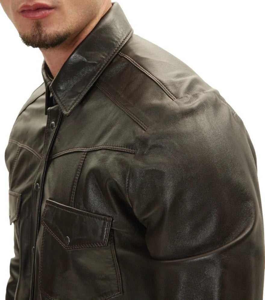 Picture of a model wearing our Dark Brown leather shirt, long sleeves, front view, close up.