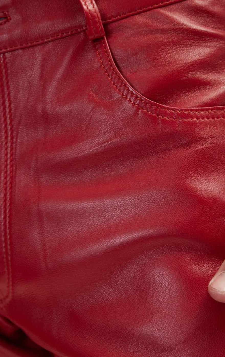 Close up view of the pocket of our Mens Red Leather jeans.