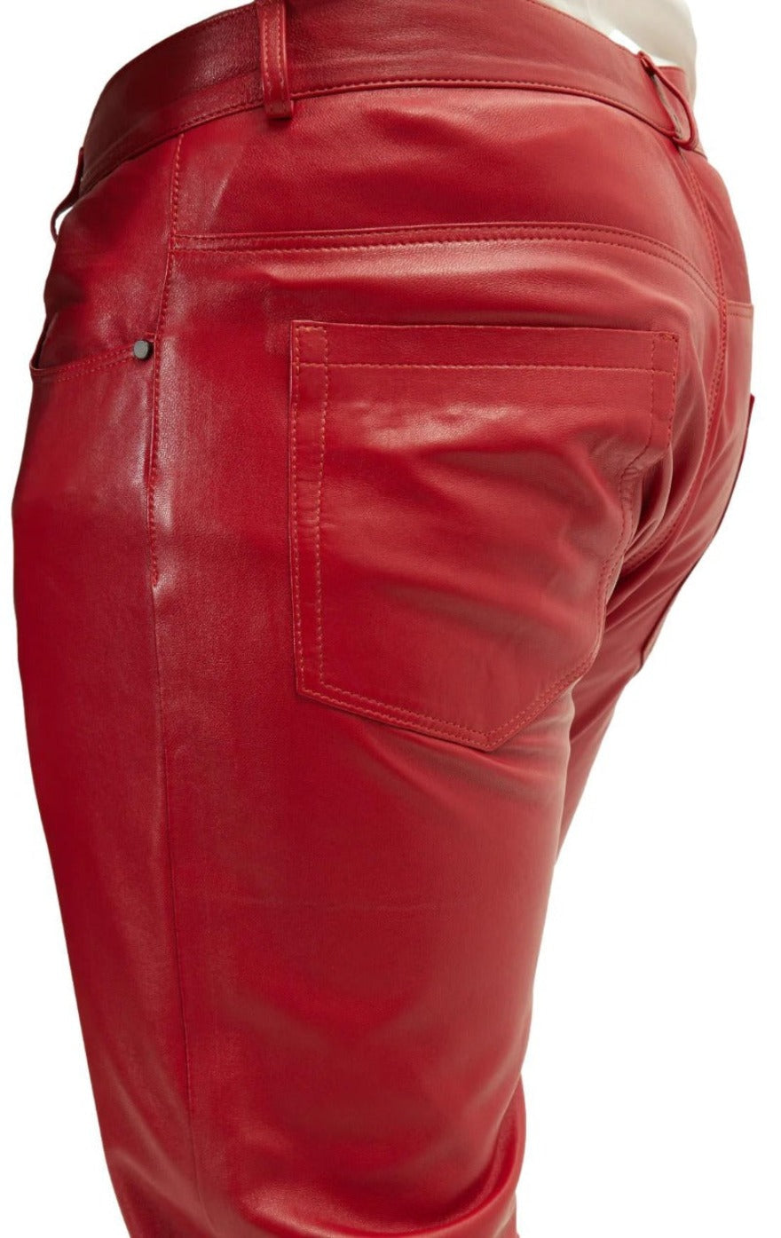 Picture of a model wearing our Mens Red Leather Jeans, side view.