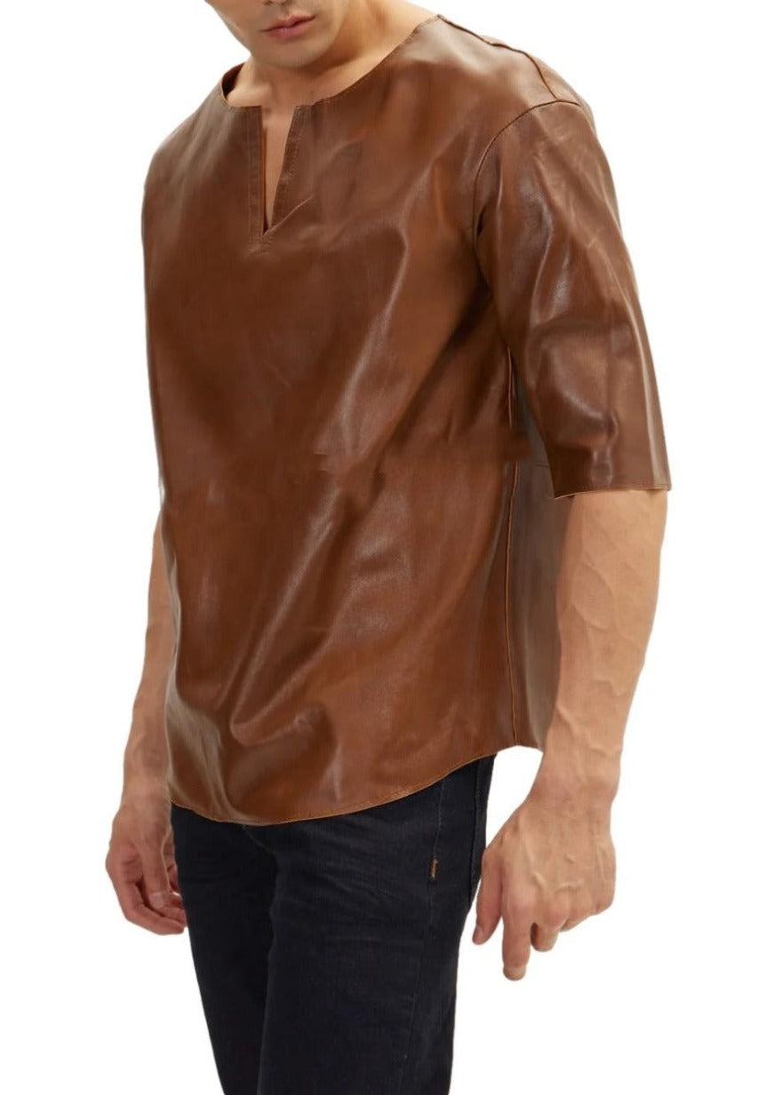 Picture of a model wearing our brown leather T shirt, side view.
