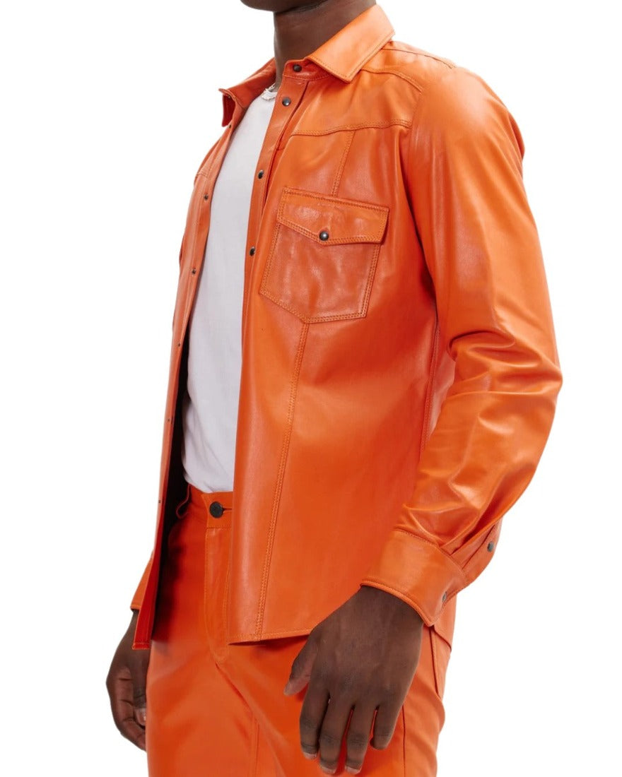 Picture of a model wearing our Orange leather shirt, side view.