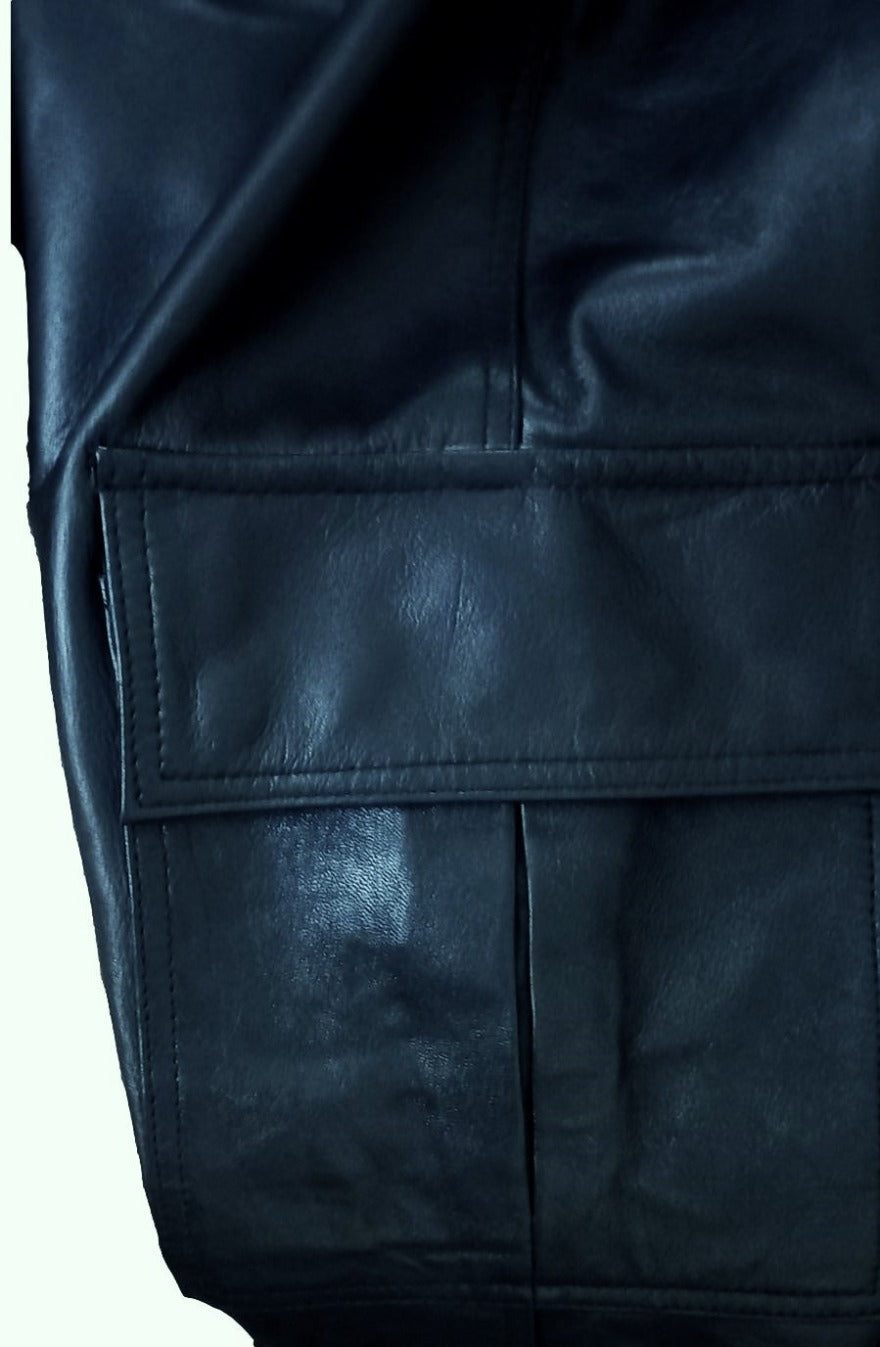 Close up view of the thigh pocket with flap  at top.