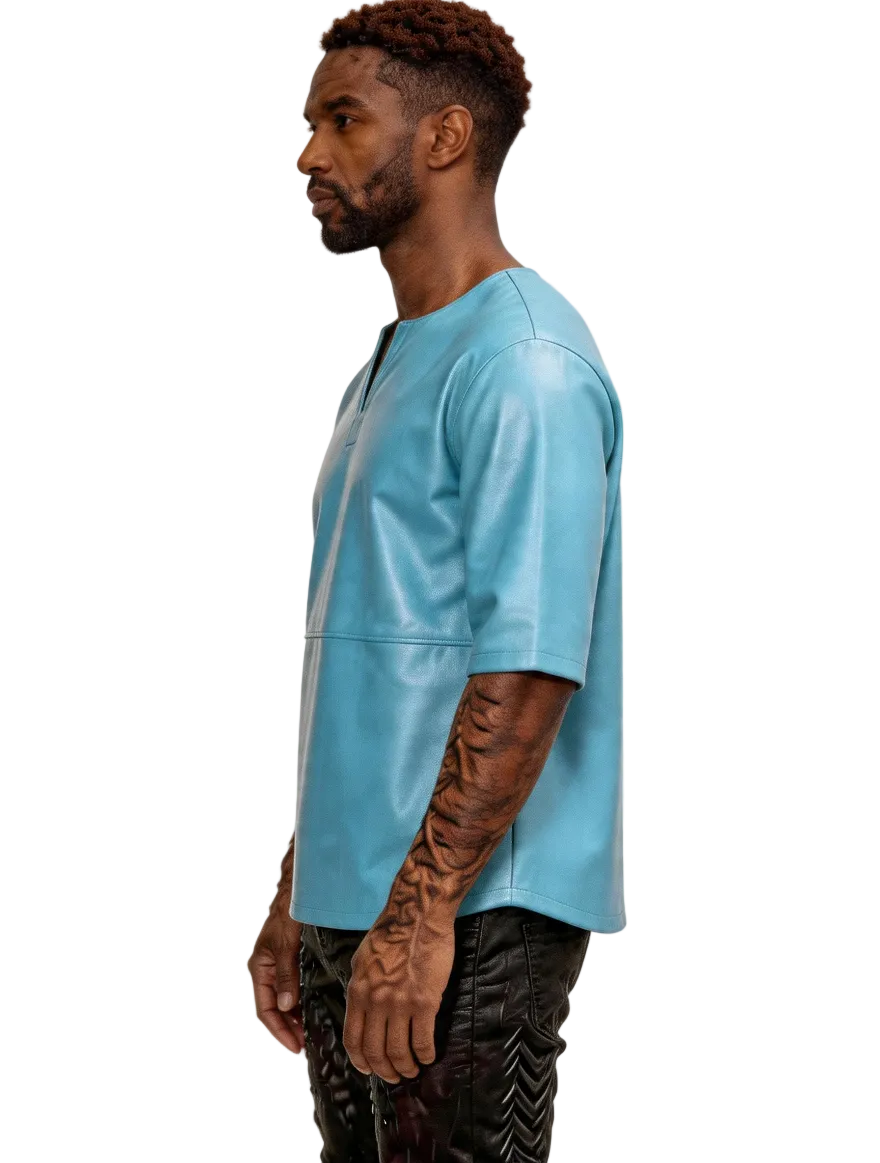Man wearing our Light Blue Leather T Shirt Mens with a white background, Side view.