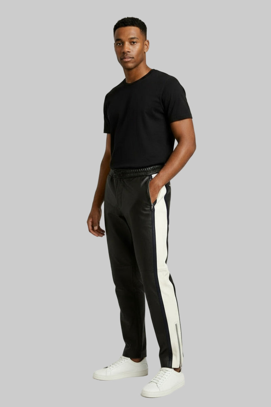 Picture of a model  wearing our Mens  Black and White Leather Pants, Side view.