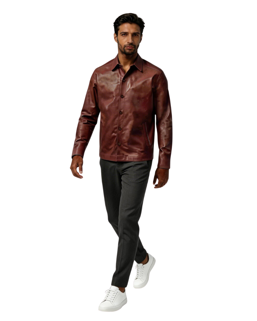 Man wearing a brown leather jacket, black pants, and white sneakers on a white background