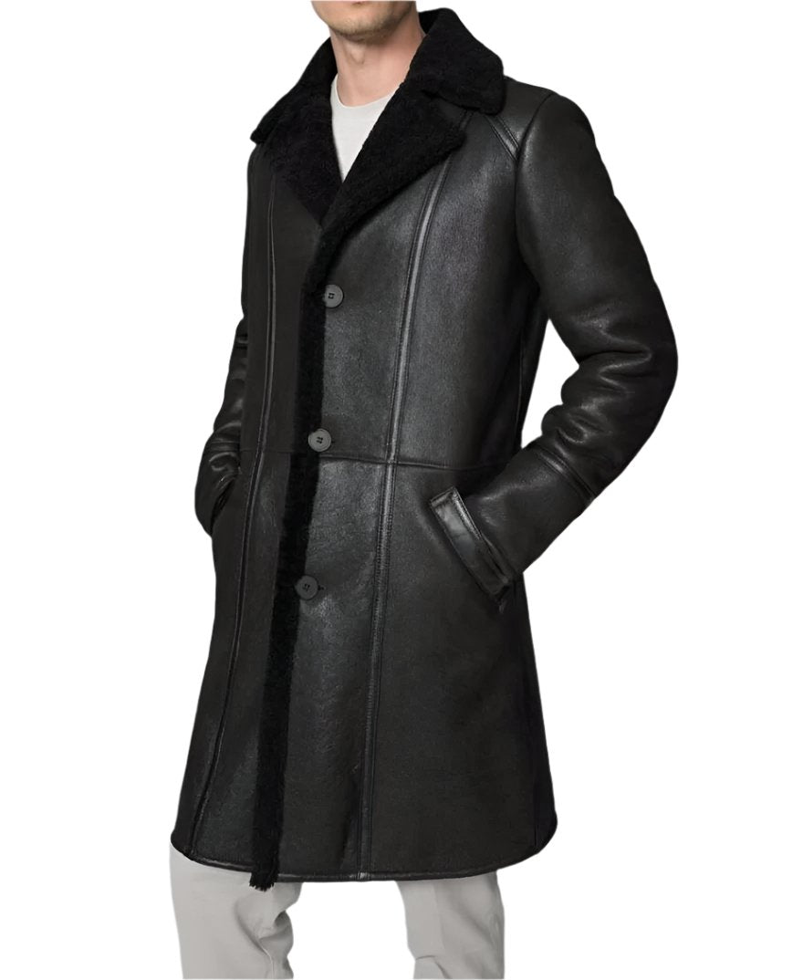 Picture of our Mens Leather Shearling Trench Coat in black on a model, side view.