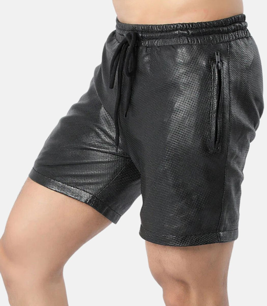 Picture of our Mens Perforated Leather Shorts in black, on a model, side view 1