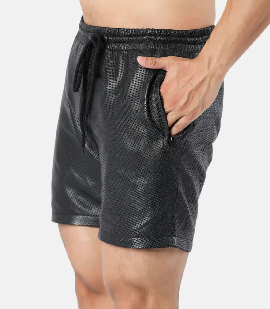 Picture of our Mens Perforated Leather Shorts in black, on a model, side view