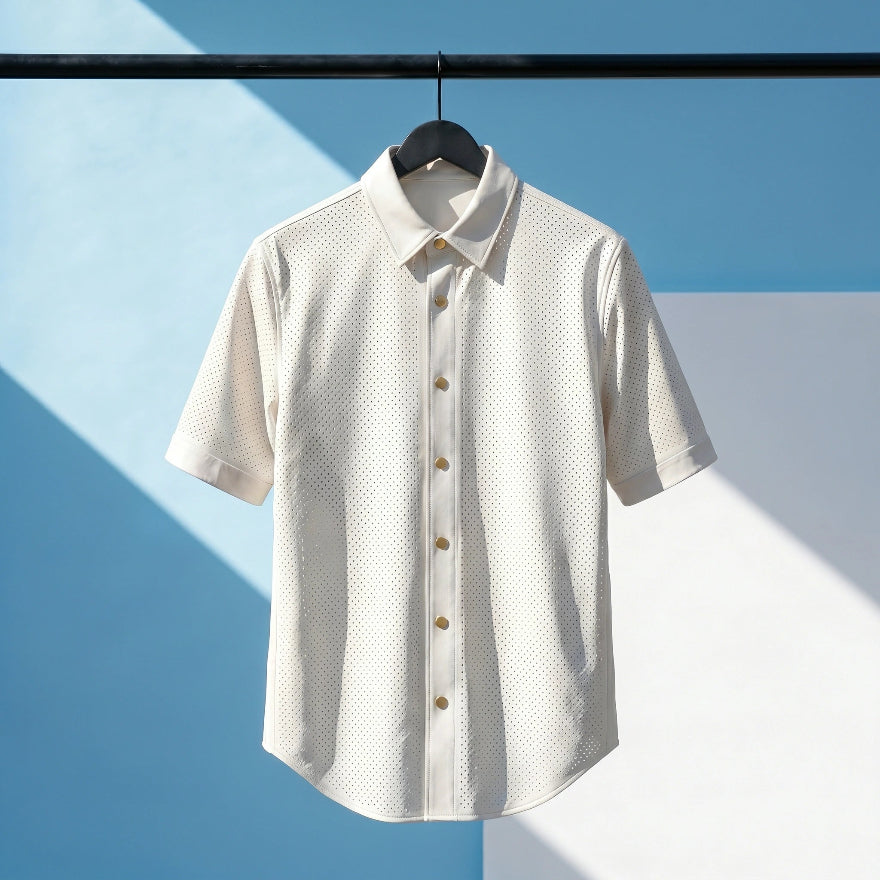 Mens White Perforated Leather Shirt | Short Sleeve Nappa Leather Button Upon a hanger against a blue geometric background, front view