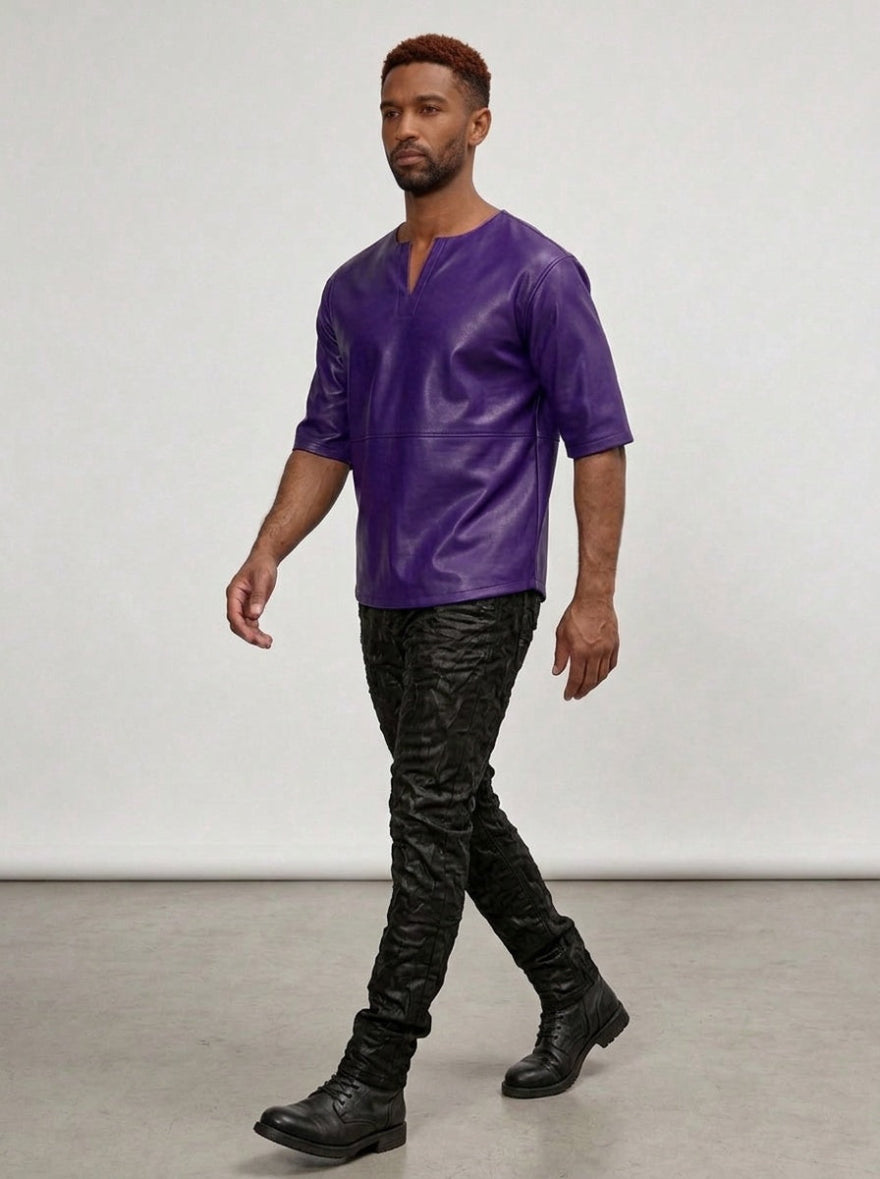 Man wearing our  Purple Leather T Shirt Mens, on a white background, walking pose.