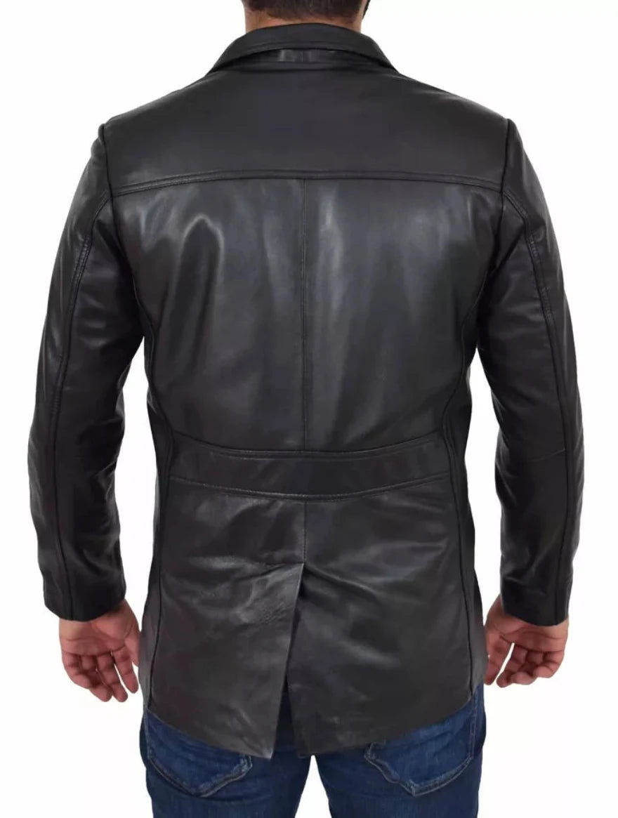 Picture of a model waring our Mens Black Trucker style leather jacket back view.