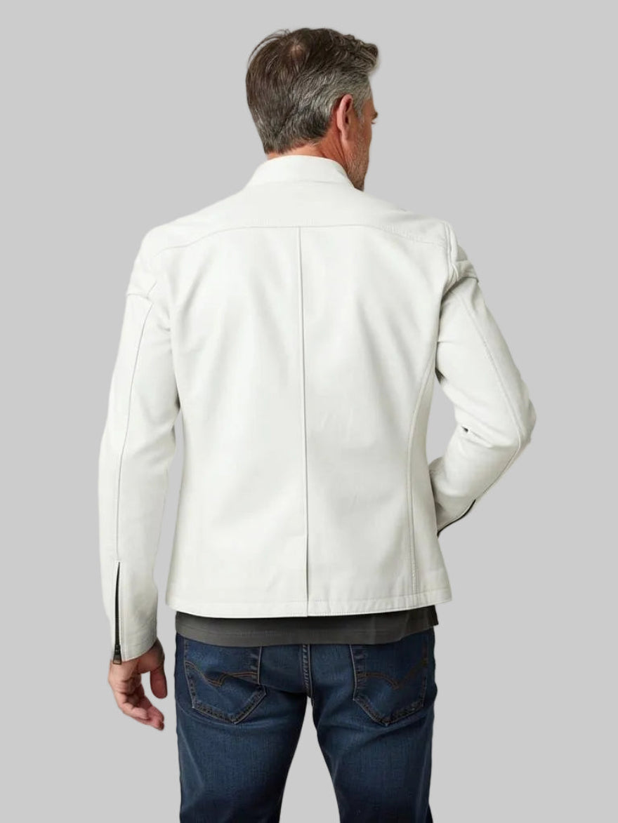 Man wearing our white cafe racer jacket and blue jeans on a plain background