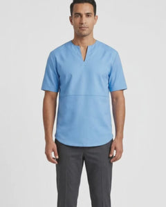 Video of a man walking down a fashion runway wearing our light blue leather tee shirt and dark gray pants.