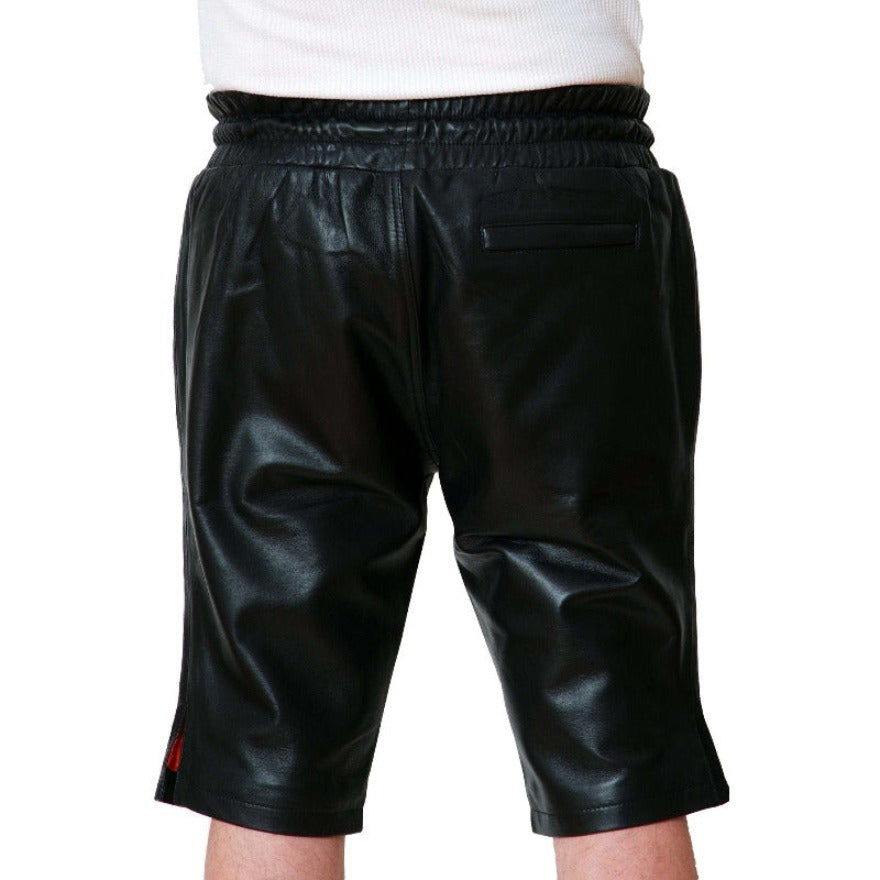 Picture of a model wearing  our Mens Black Leather Shorts, back view.