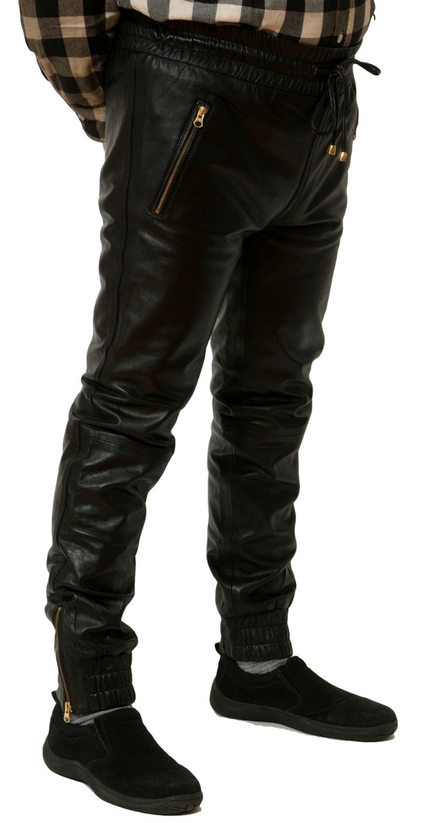 Model wearing mens black leather joggers, side view