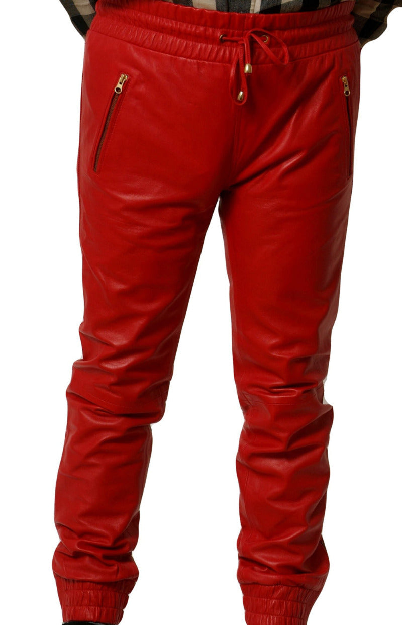 Picture of a model wearing red leather joggers,  front view