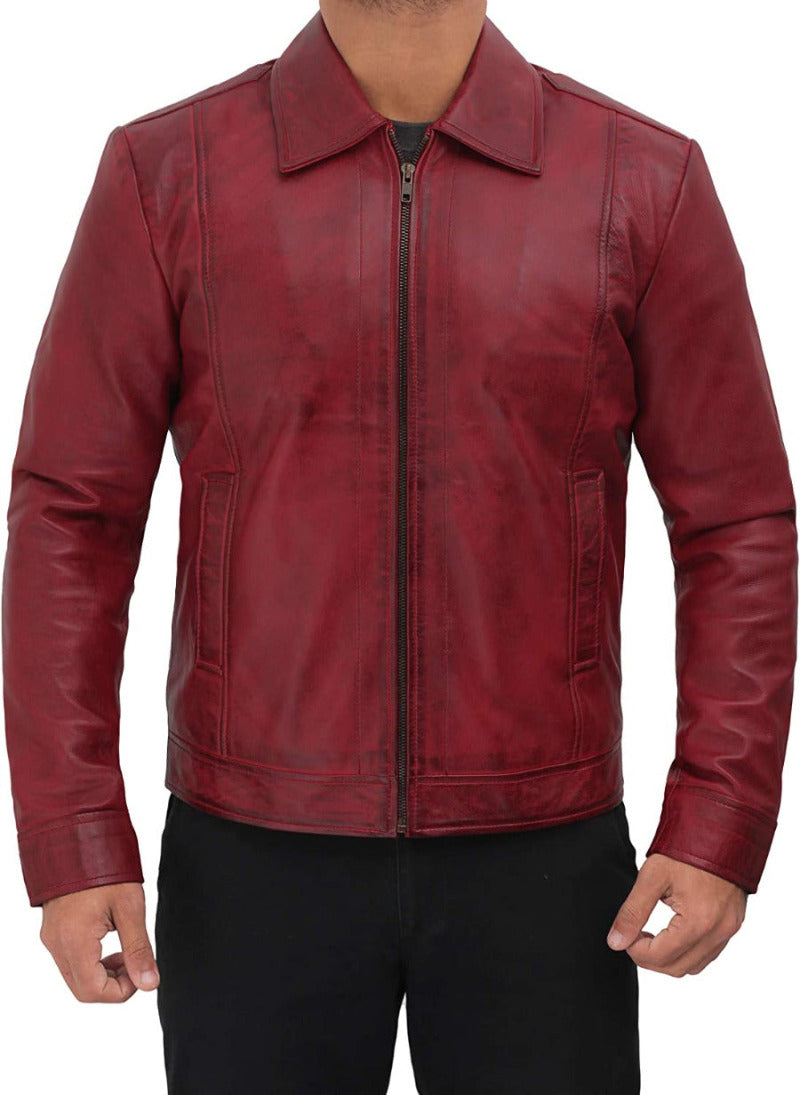 Picture of a model wearing our Mens Waxed Leather Jacket in maroon front view with zipper closed