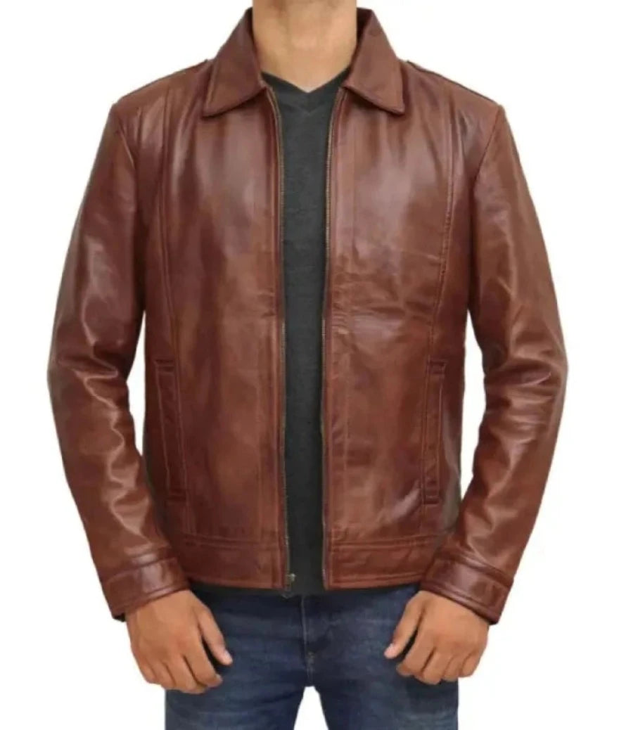 Picture of a model wearing our Brown Trucker Leather Jacket, front view.