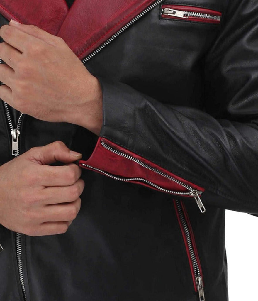 Picture of a model wearing our Leather Moto Jacket Black with maroon collar and trim, close up view of the sleeve .
