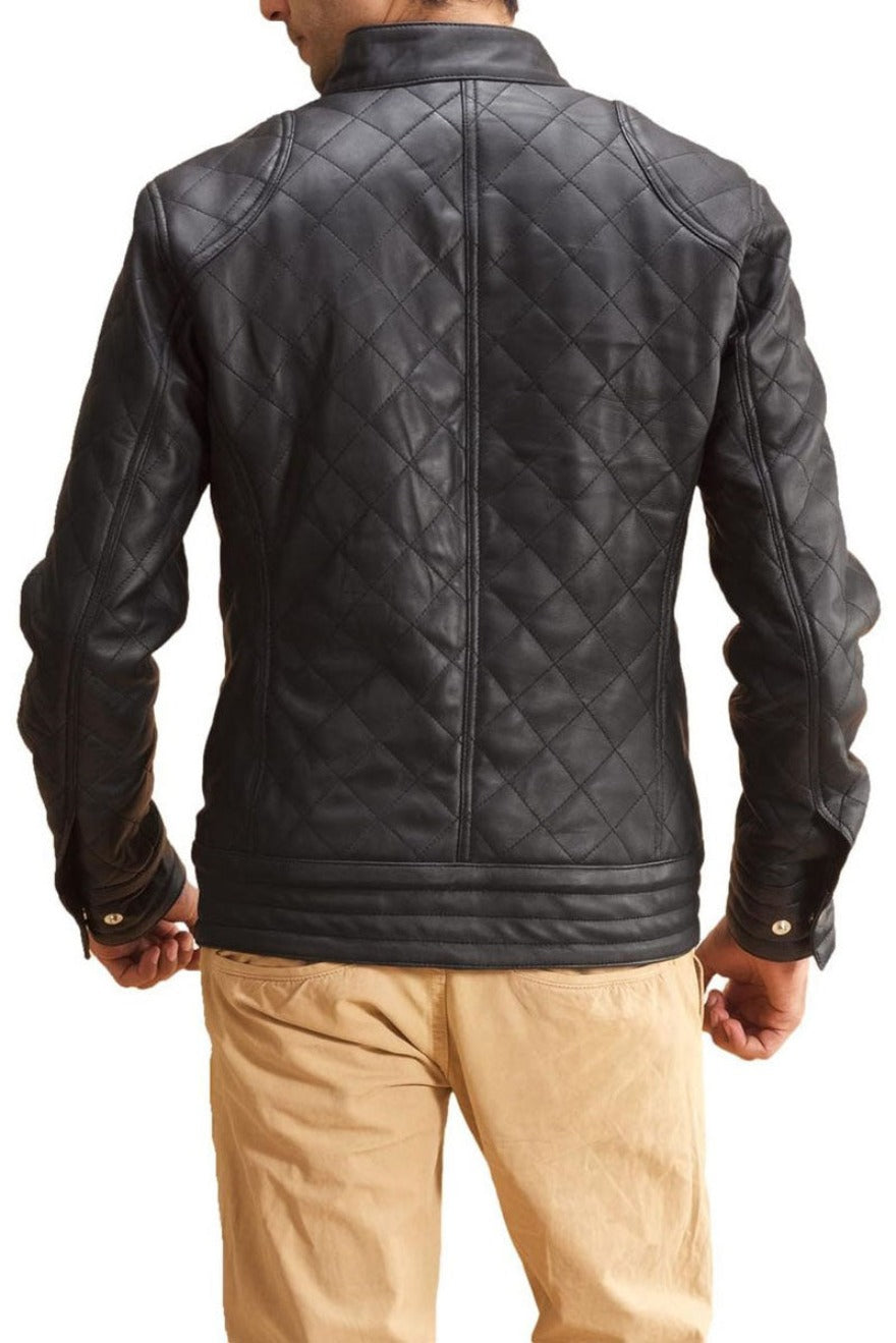 Picture of a model wearing our Black Leather Jacket Quilted  in black with silver zippers. Back view.