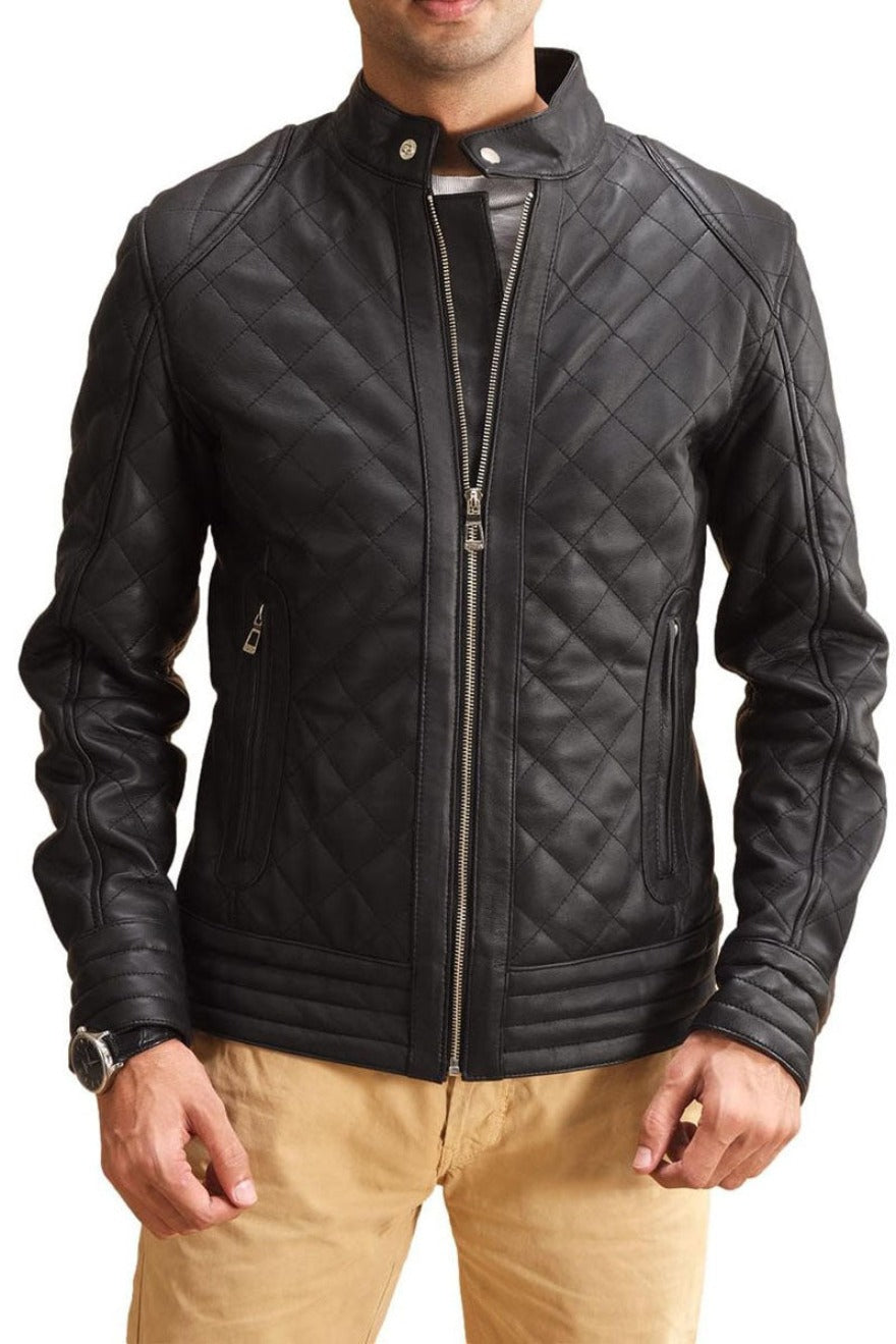 Model wearing a mens leather quilted jacket in black with silver zippers. Front view.