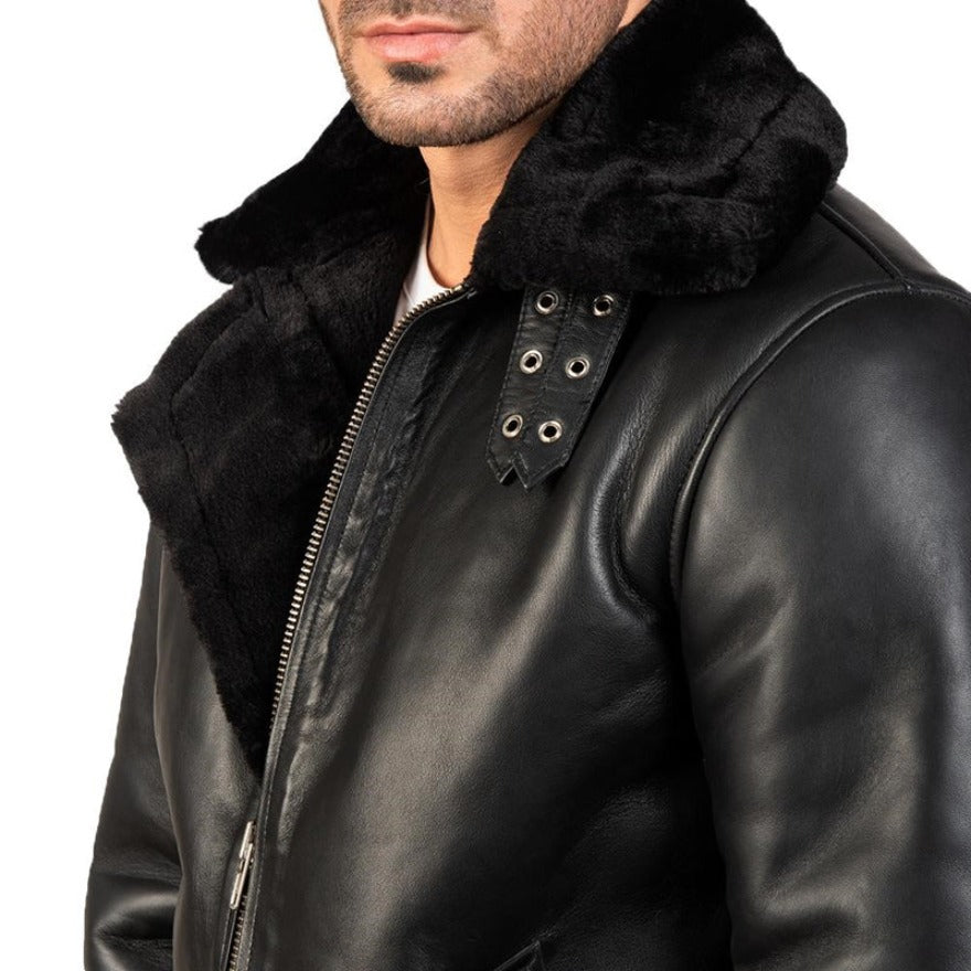 Model wearing mens shearling leather jacket with black shearling liner. Close up  view.
