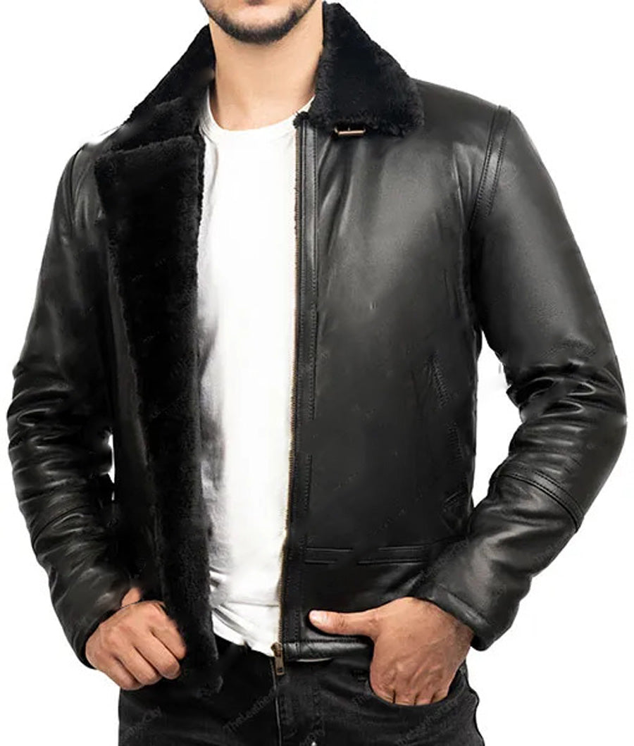 Front view  with zipper open of model wearing black shearling leather jacket.