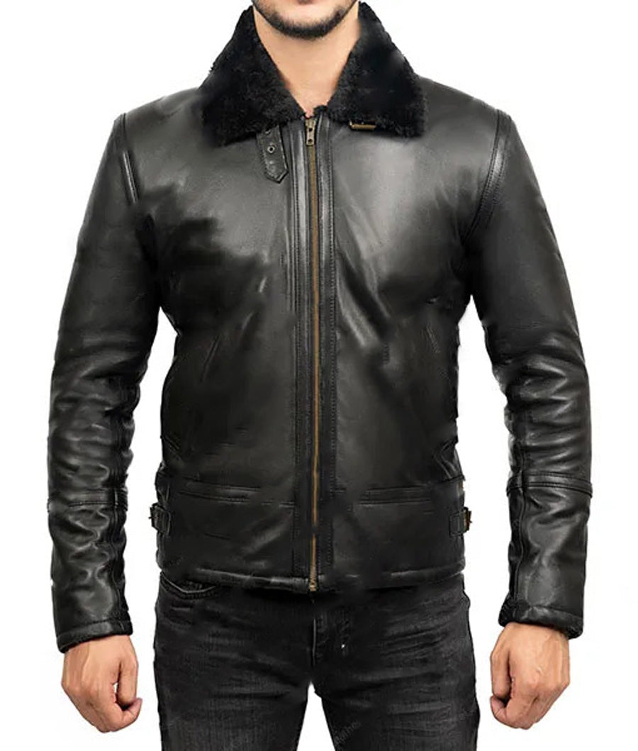 Front view of model wearing black shearling leather jacket.