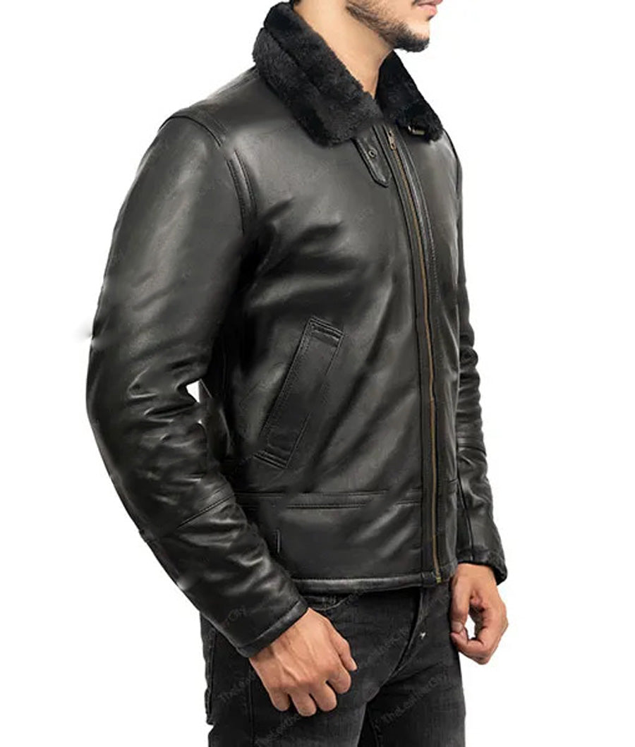 Side view of model wearing black shearling leather aviator jacket.
