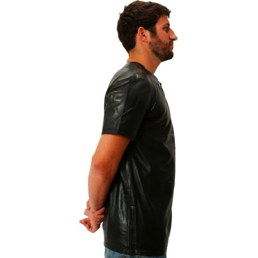 Picture of model wearing a black leather t shirt, side view